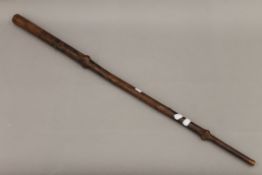A 19th century carved folk art walking stick. 92 cm long.