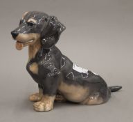 A Royal Copenhagen model of a dachshund. 19 cm high.