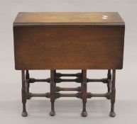 An early 20th century mahogany spider's leg gate-leg table. 53 cm long.