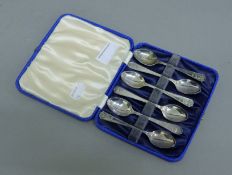 A boxed set of 1937 silver-plated Coronation teaspoons. The box 15 cm wide.