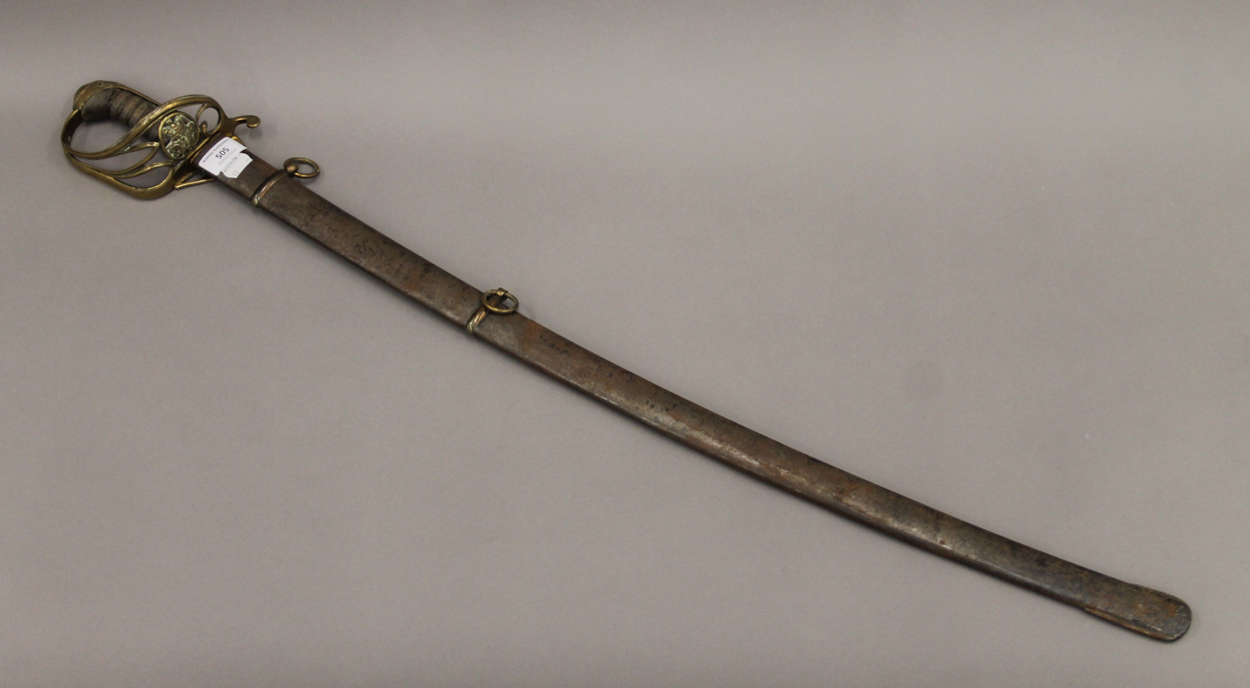 A William IV pattern 1822 infantry officer's sword in scabbard with folding guard. 98.5 cm long.