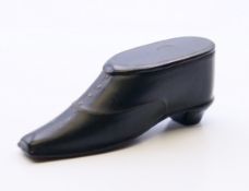 A Victorian snuff shoe. 8 cm long.