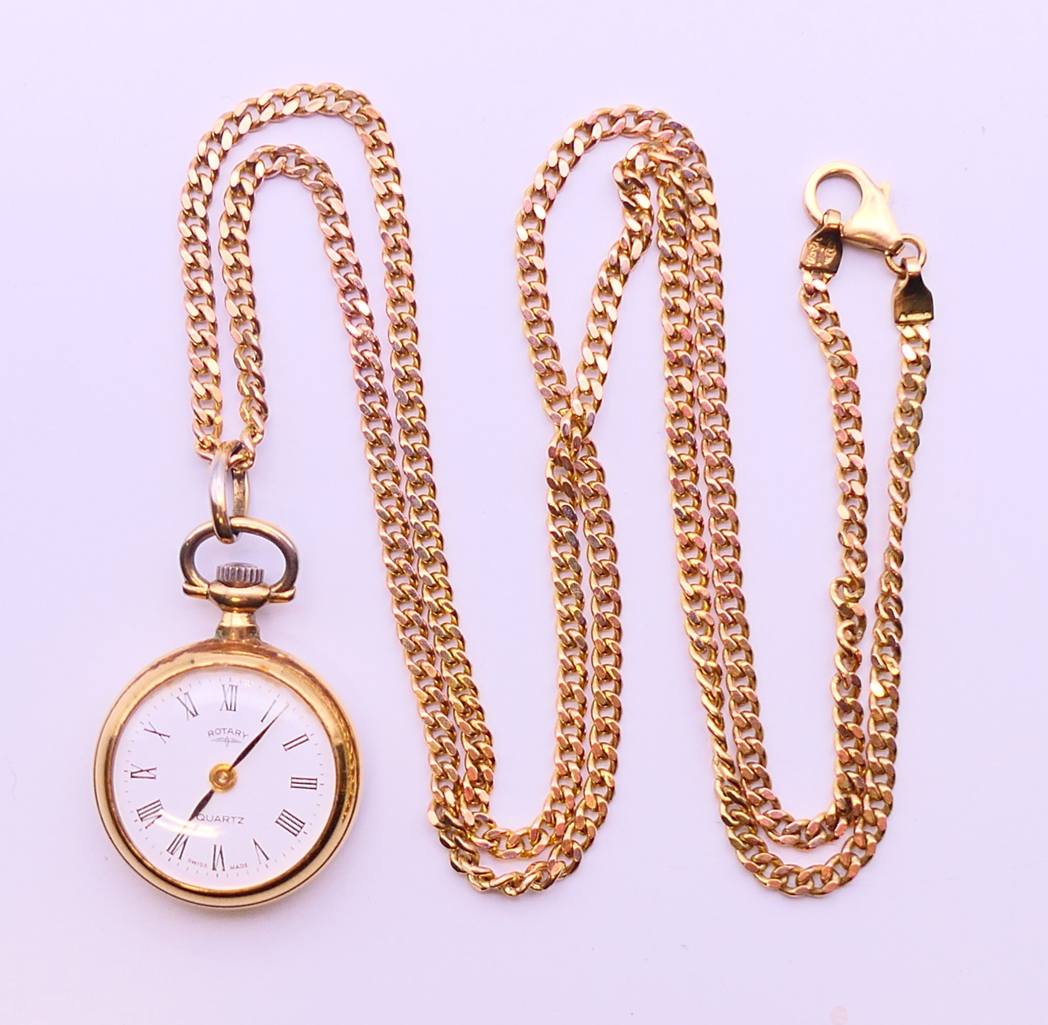 A Rotary fob watch on a 9 ct gold chain. 2.5 cm diameter, chain 62 cm long. The chain 6 grammes.