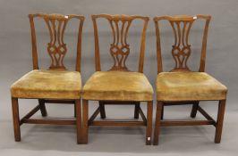 Three 19th century elm chairs. 53 cm wide.