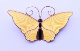 A David Andersen silver and yellow enamel butterfly brooch. 5.5 cm x 3 cm.