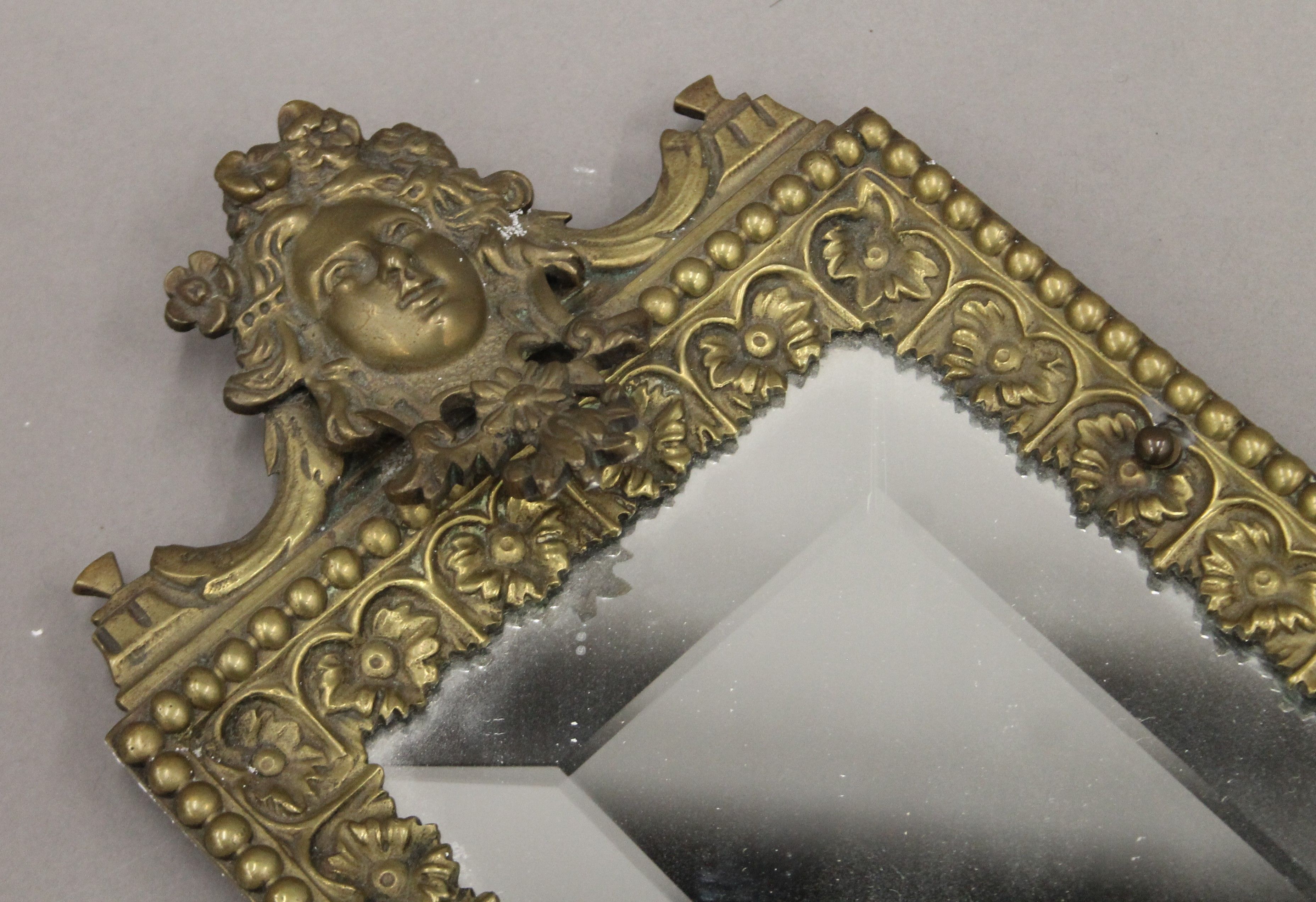 A 19th century brass wall mirror. 49 x 16 cm. - Image 2 of 3