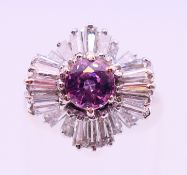 A diamond and sapphire ballerina ring, 0.9 ct natural pink sapphire with approximately 1.