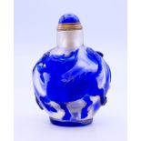 A blue Peking glass snuff bottle and stopper. 8 cm high.