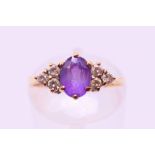 A 9 ct gold amethyst ring. Ring size K.