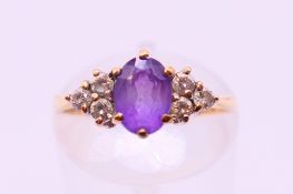A 9 ct gold amethyst ring. Ring size K.