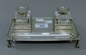 A silver desk stand with cut glass inkwells. 20 cm wide. 12.2 troy ounces.