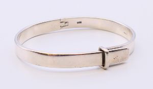 A silver hallmarked heavy bangle. 6.5 cm inner diameter. 31.2 grammes.