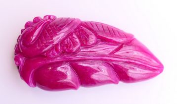 A Chinese pink hardstone carving. 8.5 cm long.