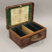 A Victorian brass-mounted leather cartridge case,