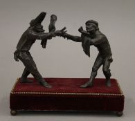 A bronze model of pair of sword fighters. 16.5 cm long.