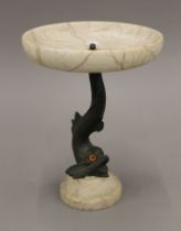 A bronze and marble tazza formed as a dolphin. 25.5 cm high.