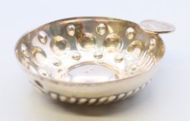 A continental wine taster. 7.5 cm diameter.