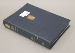 A portfolio of Churchill silver crowns. 21.5 cm wide.