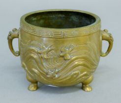 A 19th century bronze censer. 14.5 cm wide.