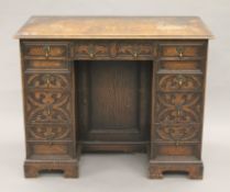 An early 20th century oak pedestal desk.