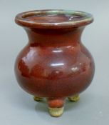 A purple splash Chinese pottery censer. 15 cm high.