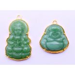 Two jade Buddha pendants. Largest 4.5 cm high.