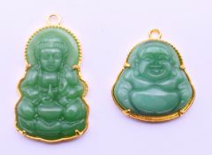 Two jade Buddha pendants. Largest 4.5 cm high.