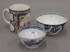 An 18th century Chinese Export porcelain tankard together with two bowls. The former 12 cm high.