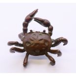 A small bronze model of a crab. 6 cm wide.