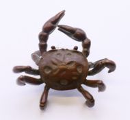 A small bronze model of a crab. 6 cm wide.