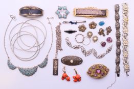 A quantity of various jewellery, including brooches, earrings and a silver ingot pendant necklace.