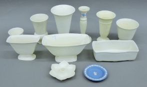 A quantity of white Wedgwood porcelain vases. The largest 20.5 cm high.