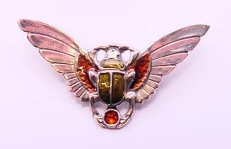 A silver l winged beetle brooch. 5.5 cm x 3 cm.