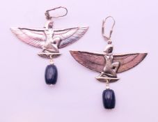 A pair silver and lapiz Art Deco style winged female earrings. 4.5 cm high.
