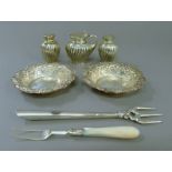 A quantity of various silver including a pair of embossed dishes, a cruet set etc.