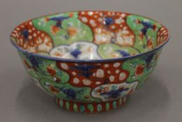 An Oriental porcelain bowl. 16 cm diameter.