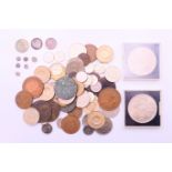 A quantity of various coins, including two silver threepenny coins, one silver sixpence coin,