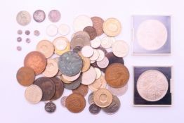 A quantity of various coins, including two silver threepenny coins, one silver sixpence coin,