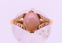 A 9 ct gold and black opal ring, certified 2.86 . Ring size N/O.