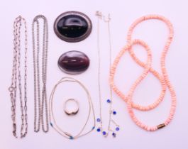 A quantity of various silver jewellery, including necklaces, brooches and a ring.