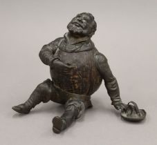 A 19th century figural inkwell, formed from a bronze-mounted coconut,