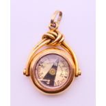 An 18 ct gold and bloodstone compass fob. 3.5 cm high. 13.8 grammes total weight.