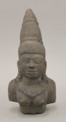 An Eastern carved stone female bust. 24 cm high.