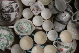 A quantity of various porcelain tea and coffee wares.
