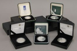 Twelve boxes Royal Mint proof silver coins.