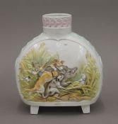 A 19th century Continental porcelain vase decorated with hunting scenes. 21.5 cm high.