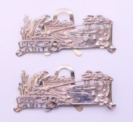 A pair of antique silver menu holders/place settings, hallmarked for Mappin Bros,