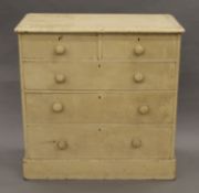 A Victorian white painted pine chest of drawers. 94.5 cm wide.