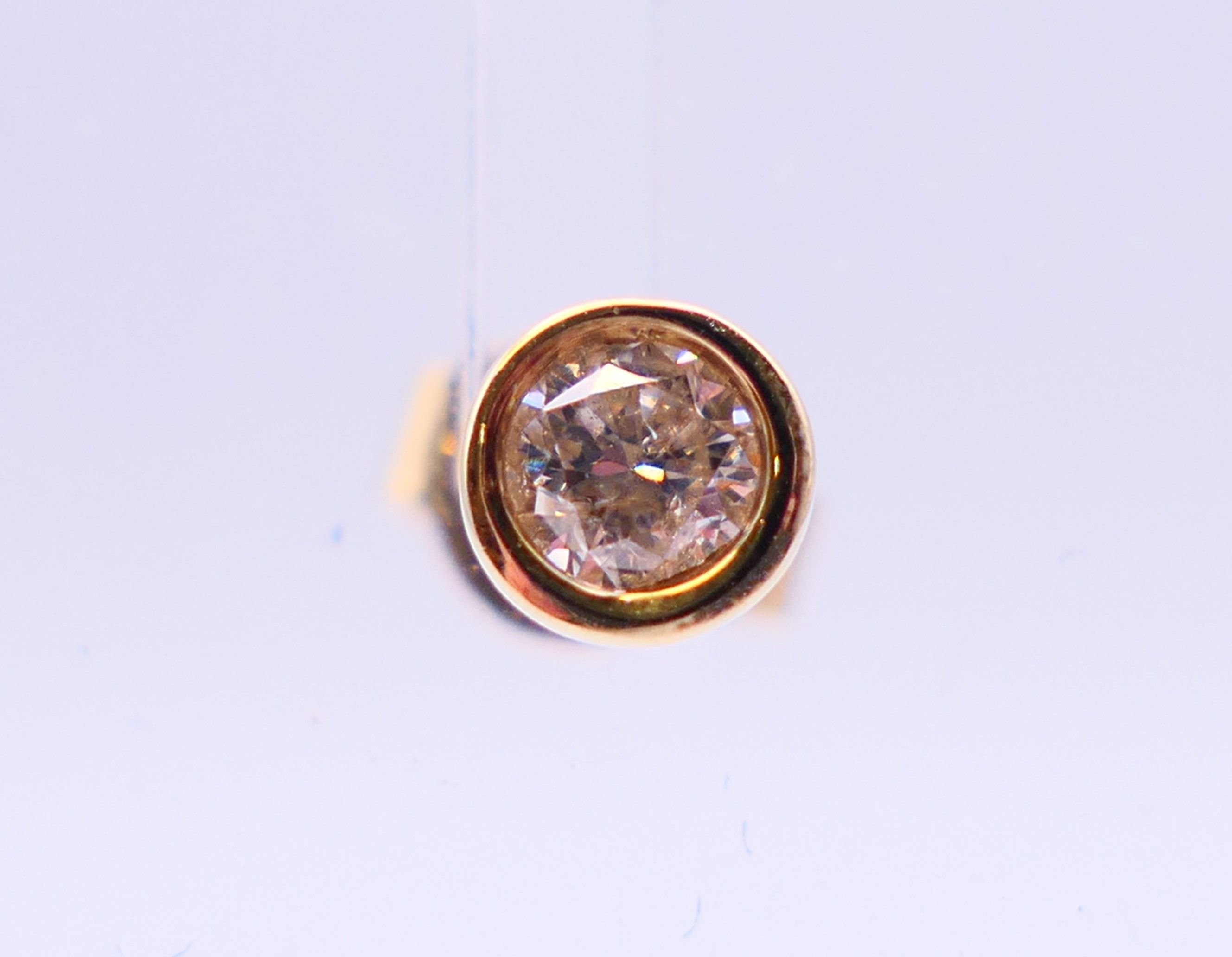 A pair of 9 ct gold diamond earrings. 0.5 ct weight. - Image 3 of 5