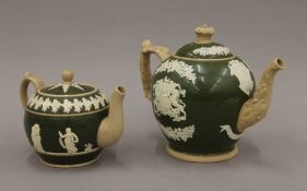 A Copeland Queen Victoria Diamond Jubilee teapot and another Copeland teapot. The former 21 cm long.
